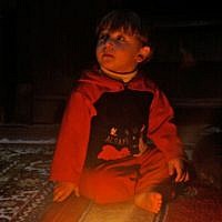 A home in Qalaat al-Madik: Generators and fuel are scarce and so most Syrians must wait in the dark. (photo: Eliyahu Kamisher)