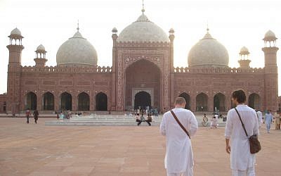 Jonathan Garfinkel, right, visits the Badshahi Mosque in Lahore, Pakistan, with director Christopher Morris. (Courtesy of Vicki Strouch)