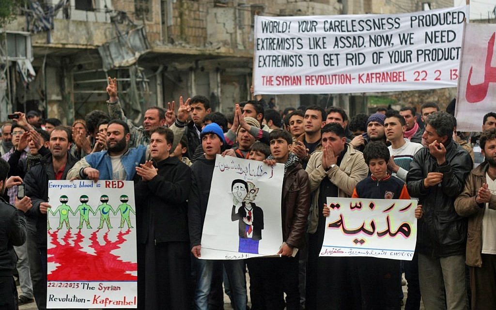 In Kfar Nabul, civilians protest the rising influence in their town of the Jihadist al-Nusra Front. (photo: Eliyahu Kamisher)