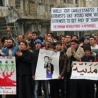 In Kfar Nabul, civilians protest the rising influence in their town of the Jihadist al-Nusra Front. (photo: Eliyahu Kamisher)