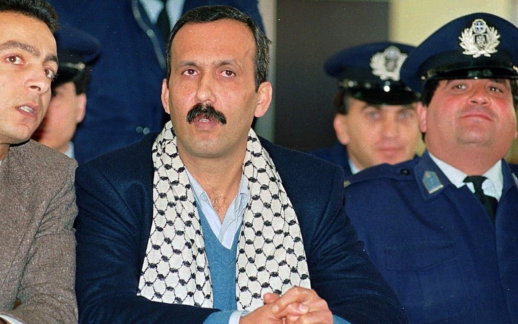 Mohammed Rashed, center, convicted of the 1982 Pan Am jetliner bombing, listens to his unidentified PLO interpreter, left, during his appeals court hearing in Athens, Greece in December 1991 (photo credit: AP/Aris Saris, File) Mohammed Rashed, center, convicted of the 1982 Pan Am jetliner bombing, listens to his unidentified PLO interpreter, left, during his appeals court hearing in Athens, Greece in December 1991 (photo credit: AP/Aris Saris, File)