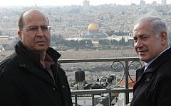 Prime Minister Benjamin Netanyahu (R) and incoming Defense Minister Moshe Ya'alon overlook the Old City of Jerusalem last year. (photo credit: Kobi Gideon/Flash90)