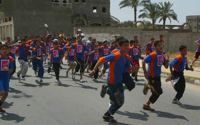 Illustrative photo of Palestinian youths racing during a 2010 festival in Khan Younis, southern Gaza Strip (photo credit: Abed Rahim Khatib/Flash90) Illustrative photo of Palestinian youths racing during a 2010 festival in Khan Younis, southern Gaza Strip (photo credit: Abed Rahim Khatib/Flash90)