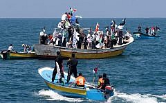Hamas naval policemen and Palestinians prepare for the arrival of the flotilla to Gaza on May 30, 2010. (Abed Rahim Khatib/Flash90)
