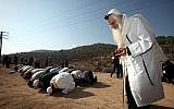 Rabbi Menachem Froman taking part in a prayer for rain with Muslims in 2011. (photo credit: Yossi Zamir/Flash90)