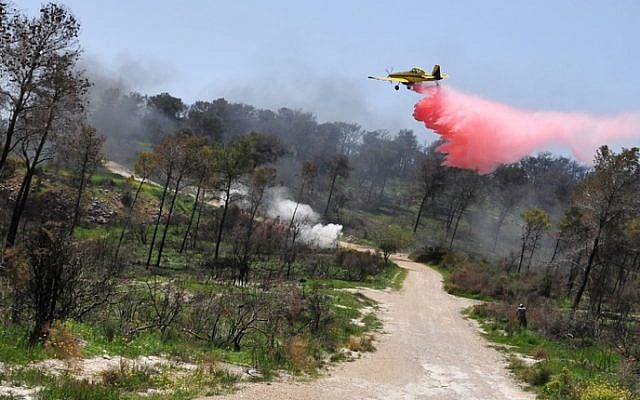 An Air Tractor AT-802 practicing aerial suppression near Beit Oren, in April 2011 (photo credit: Shay Levy/Flash 90)