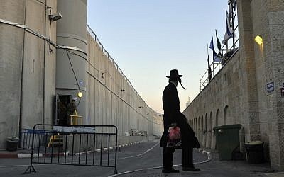 An ultra-Orthodox man within the heavily fortified space of Rachel's Tomb (Sege Attal/Flash 90)