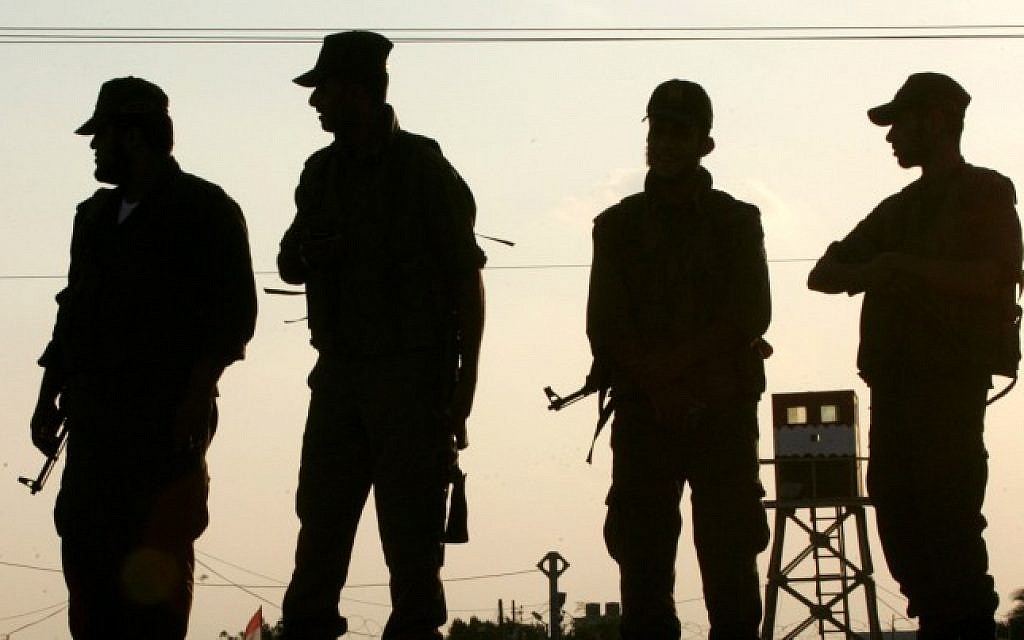Hamas security officers stand guard in the southern Gaza Strip in October 2012. (photo credit: Abed Rahim Khatib/Flash 90) Hamas security officers stand guard in the southern Gaza Strip in October 2012. (photo credit: Abed Rahim Khatib/Flash 90)