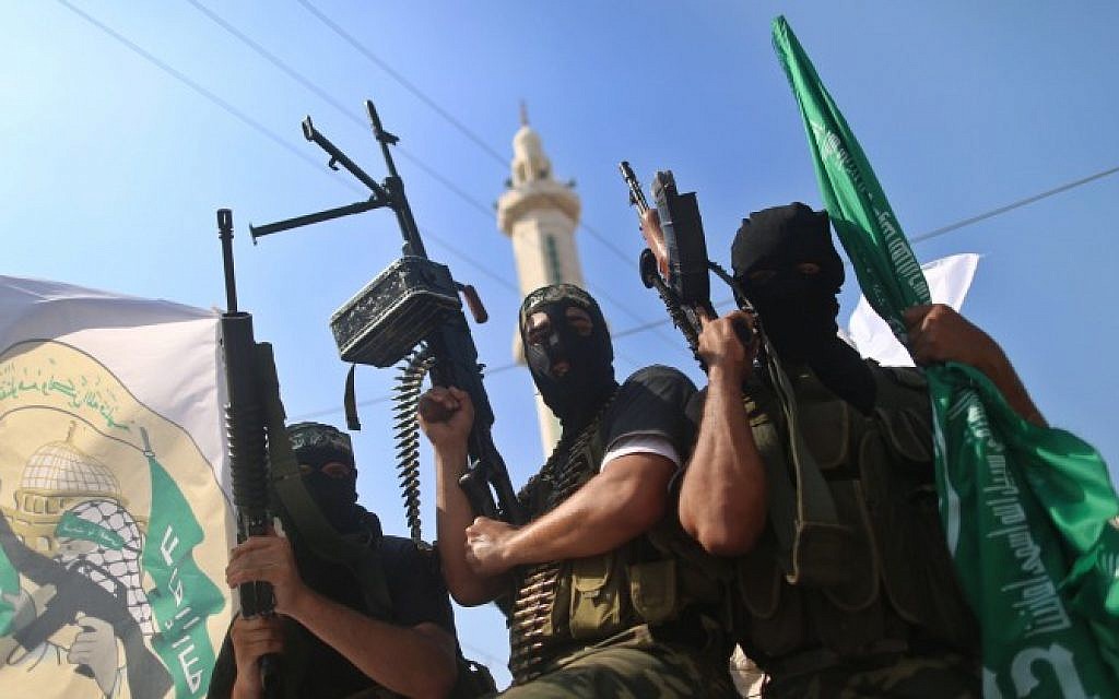 Hamas terrorists in Gaza pose on anniversary of prisoner exchange deal for Gilad Shalit. October 18, 2012 (photo credit: Wissam Nassar/Flash90) Hamas terrorists in Gaza pose on anniversary of prisoner exchange deal for Gilad Shalit. October 18, 2012 (photo credit: Wissam Nassar/Flash90)