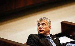 Yair Lapid, leader of the Yesh Atid party, in the Knesset in Jerusalem, February, 2013. (photo credit: FLASH90)