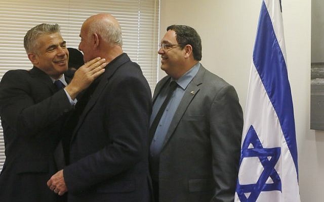 Yair Lapid, leader of the Yesh Atid political party, with his No. 2 Shai Piron (right) and fellow MK Yaakov Peri (center), in the Knesset last month. Photo credit: Miriam Alster/FLASH90) Yair Lapid, leader of the Yesh Atid political party, with his No. 2 Shai Piron (right) and fellow MK Yaakov Peri (center), in the Knesset last month. Photo credit: Miriam Alster/FLASH90)