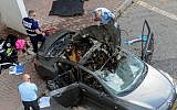 Police inspect the remnants of a car bomb that killed two people  in Rishon Lezion in March 2013. A dozen people have been killed over the past two years in a mob war in the cities south of Tel Aviv (photo credit: Yossi Zeliger/ Flash90)