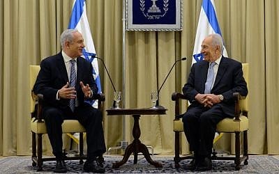 President Shimon Peres (right) meets on Saturday evening with head of the Likud party, Prime Minister Benjamin Netanyahu, and grants the premier a two-week extension to assemble a coalition. (photo credit: Kobi Gideon/Flash90)
