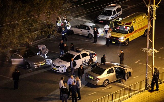 The crime scene in Kiryat Ata, where the suspected killer took his own life. (photo credit: Avishay Shaar Yashuv/Flash90)