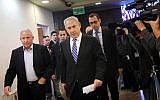 Benjamin Netanyahu (center), arriving at the Cabinet meeting Sunday with Minister Avi Dichter. (photo credit: Miriam Alster/Flash90)
