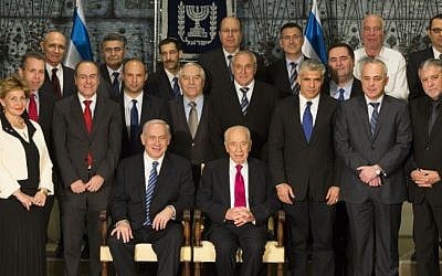 Ministers in Israel's 33rd government pose with President Peres, March 18, 2013. (photo credit: Yonatan Sindel/Flash90) Ministers in Israel's 33rd government pose with President Peres, March 18, 2013. (photo credit: Yonatan Sindel/Flash90)