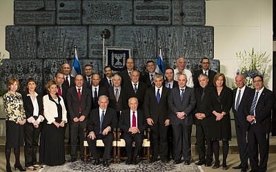 The new Cabinet posing for a photo with President Shimon Peres, March 18. (photo credit: Yonatan Sindel/Flash90) The new Cabinet posing for a photo with President Shimon Peres, March 18. (photo credit: Yonatan Sindel/Flash90)