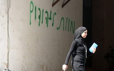 'Death to the Jews' painted on a Jaffa wall in March 2013 (photo credit: Roni Schutzer/Flash90)