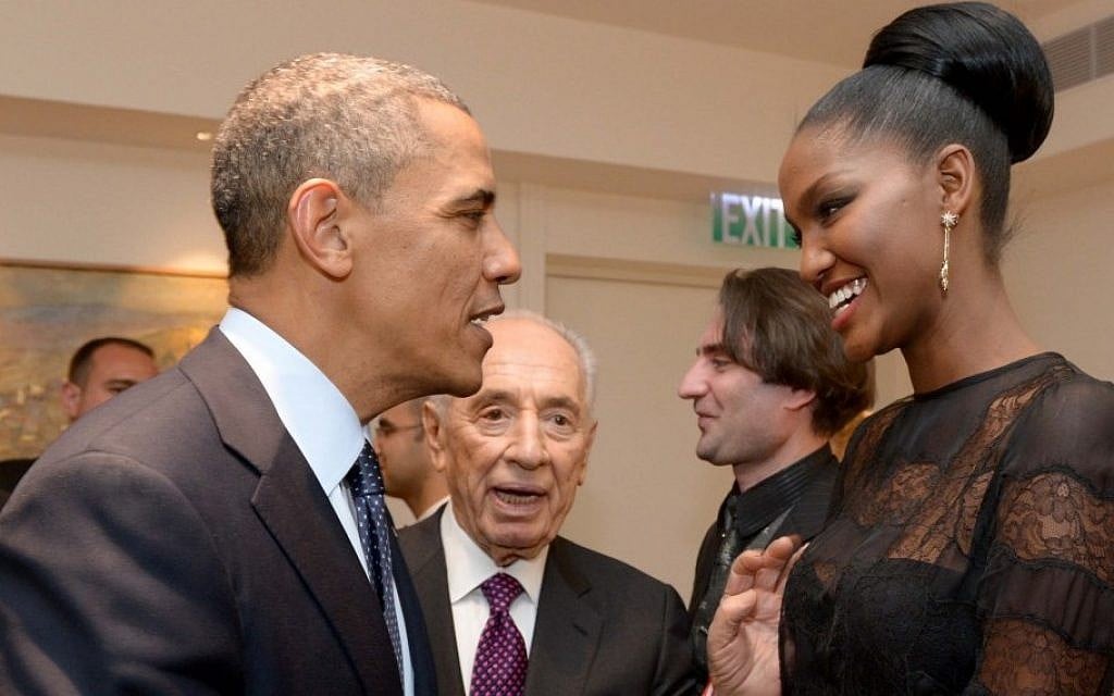 President Barack Obama shakes hands with Yityish Aynaw, a 21-year old Ethiopian-Israeli who won Israel's Miss Israel national beauty pageant, at the President's Residence in Jerusalem on March 21, 2013. (Photo credit: Avi Ohayon/GPO/FLASH90) President Barack Obama shakes hands with Yityish Aynaw, a 21-year old Ethiopian-Israeli who won Israel's Miss Israel national beauty pageant, at the President's Residence in Jerusalem on March 21, 2013. (Photo credit: Avi Ohayon/GPO/FLASH90)