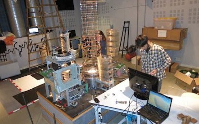A worker prepares the Maker Faire site (Photo Credit: The Bloomfield Science Museum Jerusalem)