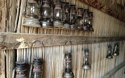 A wall of lanterns at Beerotayim, a rustic campsite in Ezuz, one of the villages in Nitzana (photo credit: Jessica Steinberg/Times of Israel)