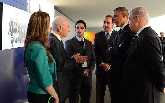 Intel programmer Sa'id Haruf (facing front) flanked by (left to right) Ola Zahar, head of Maantech, which promotes Arab participation in the Israeli tech industry; late former President Shimon Peres; Boaz Maoz, CEO Cisco Israel; former US President Barack Obama; Prime Minister Benjamin Netanyahu. The meeting took place in March 2013, during a visit by Obama to Israel. (Courtesy of the President's Office) Intel programmer Sa'id Haruf (facing front) flanked by (left to right) Ola Zahar, head of Maantech, which promotes Arab participation in the Israeli tech industry; late former President Shimon Peres; Boaz Maoz, CEO Cisco Israel; former US President Barack Obama; Prime Minister Benjamin Netanyahu. The meeting took place in March 2013, during a visit by Obama to Israel. (Courtesy of the President's Office)
