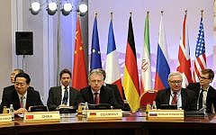 Negotiators from China, Germany and Russia at the P5+1 talks in Almaty in March. (photo credit: AP/Ilyas Omarov, Pool)