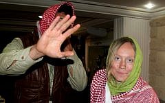 Amir Omar Hassan, left, and Ingvild Selvik Ask, who were abducted by Bedouin gunmen last week, are seen after their release Monday at police headquarters in el-Arish, Egypt (photo credit: AP/Khaled Kandil)