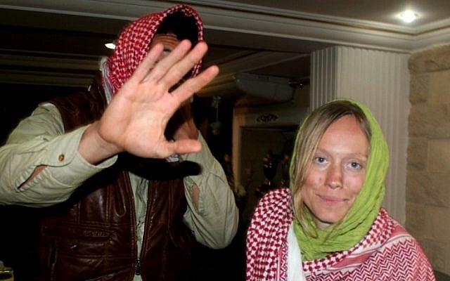 Amir Omar Hassan, left, and Ingvild Selvik Ask, who were abducted by Bedouin gunmen last week, are seen after their release Monday at police headquarters in el-Arish, Egypt (photo credit: AP/Khaled Kandil) Amir Omar Hassan, left, and Ingvild Selvik Ask, who were abducted by Bedouin gunmen last week, are seen after their release Monday at police headquarters in el-Arish, Egypt (photo credit: AP/Khaled Kandil)