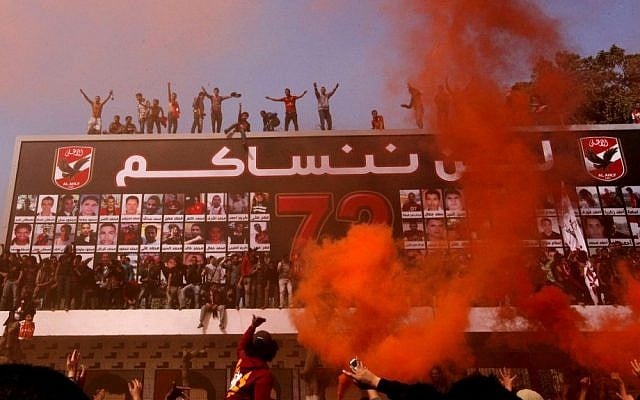 Egyptian soccer fans of Al-Ahly club celebrate in front of their club in Cairo, Egypt, Saturday, March 9. (AP Photo/Amr Nabil) Egyptian soccer fans of Al-Ahly club celebrate in front of their club in Cairo, Egypt, Saturday, March 9. (AP Photo/Amr Nabil)
