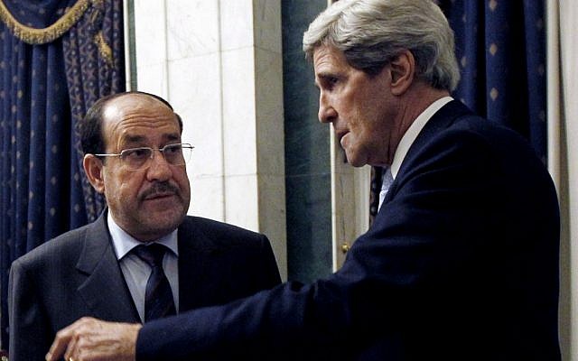US Secretary of State John Kerry (right) meets with Iraq's Prime Minister Nouri al-Maliki in Baghdad, Iraq, Sunday, March 24, 2013. (photo credit: AP/Jason Reed) US Secretary of State John Kerry (right) meets with Iraq's Prime Minister Nouri al-Maliki in Baghdad, Iraq, Sunday, March 24, 2013. (photo credit: AP/Jason Reed)