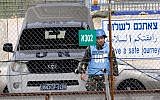 A UN peacekeeper from the Philippines crosses back from Syria at the Quneitra Crossing between Syria and the Israeli Golan Heights,Thursday, March 7. (photo credit: AP/Ariel Schalit)
