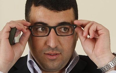 In this Saturday, 30 March, 2013 photo, Palestinian journalist Mamdooh Hamamreh adjusts his glasses during an interview with the Associated Press in the West Bank village of Hussan, near Bethlehem. Last week, an appeals court in the West Bank upheld a one-year prison term for Hamamreh for "defaming" Palestinian Authority President Mahmoud Abbas in a Facebook post. (AP Photo/Nasser Shiyoukhi) In this Saturday, 30 March, 2013 photo, Palestinian journalist Mamdooh Hamamreh adjusts his glasses during an interview with the Associated Press in the West Bank village of Hussan, near Bethlehem. Last week, an appeals court in the West Bank upheld a one-year prison term for Hamamreh for "defaming" Palestinian Authority President Mahmoud Abbas in a Facebook post. (AP Photo/Nasser Shiyoukhi)