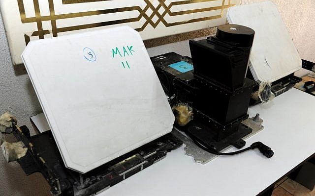 Photo released by the Syrian official news agency SANA showing devices that were found in country’s coastal region, northwest of Damascus. SANA claims the devices are designed to photograph, register and transfer data. (AP Photo/SANA)