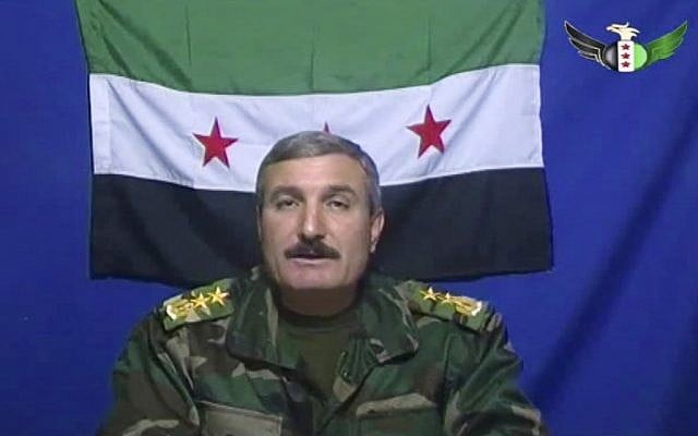 Syrian Commander Riad al-Asaad appears on a video posted on the Free Syrian Army's Facebook page (photo credit: AP/Free Syrian Army) Syrian Commander Riad al-Asaad appears on a video posted on the Free Syrian Army's Facebook page (photo credit: AP/Free Syrian Army)
