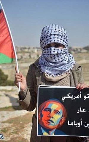 An anti-Obama Palestinian protester, location unknown (photo credit: Facebook/Quds News Network)  