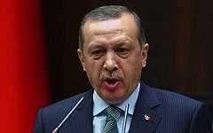 Turkey's Prime Minister Recep Tayyip Erdogan addresses lawmakers in Ankara, Turkey, Tuesday, March 19, 2013. (photo credit: AP)