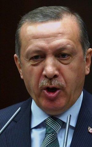 Turkey's Prime Minister Recep Tayyip Erdogan addresses lawmakers in Ankara, Turkey, Tuesday, March 19, 2013. (photo credit: AP)