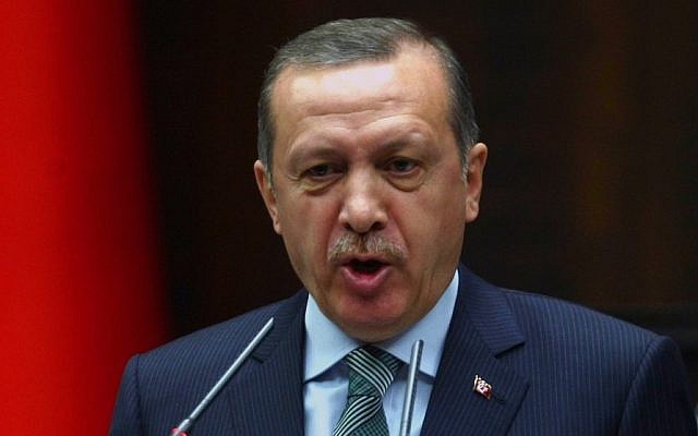 Turkey's Prime Minister Recep Tayyip Erdogan addresses lawmakers in Ankara, Turkey, Tuesday, March 19, 2013. (photo credit: AP)