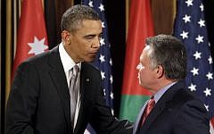 US President Barack Obama, left, and Jordan's King Abdullah II shake hands following a joint press conference at the King's Palace in Amman, Jordan, on Friday, March 23, 2013. (photo credit: AP/Pablo Martinez Monsivais)