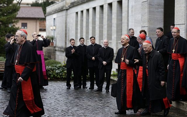 From left, US Cardinals Justin Francis Rigali, Donald Wuerl, Timothy Dolan, Francis George and Roger Mahony leave the North American College to go to the Vatican's Domus Sanctae Martae, the Vatican hotel where the cardinals stay during the conclave, in Rome, on Tuesday March 12, 2013. (photo credit: AP Photo/Alessandra Tarantino) From left, US Cardinals Justin Francis Rigali, Donald Wuerl, Timothy Dolan, Francis George and Roger Mahony leave the North American College to go to the Vatican's Domus Sanctae Martae, the Vatican hotel where the cardinals stay during the conclave, in Rome, on Tuesday March 12, 2013. (photo credit: AP Photo/Alessandra Tarantino)