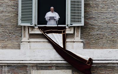 Pope Francis recites the Angelus prayer to the crowd in St. Peter's Square at the Vatican, Sunday, March 17, 2013. (photo credit: AP/Dmitry Lovetsky)