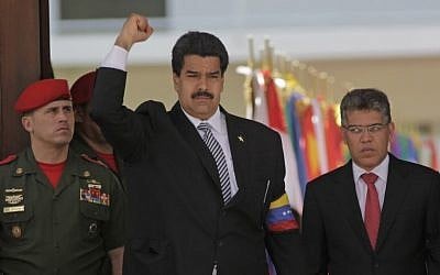 Venezuela's then-vice president Nicolas Maduro attends the funeral of the late president Hugo Chavez in Caracas, Venezuela, in March (photo credit: AP/Rodrigo Abd/File)