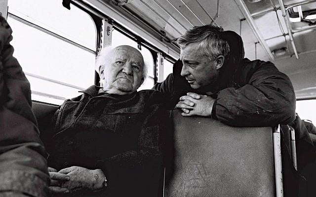 David Ben Gurion (left) and then-major general Ariel Sharon during a bus ride along the Israeli army positions on the Egyptian border in 1973. (IDF/Flash90) David Ben Gurion (left) and then-major general Ariel Sharon during a bus ride along the Israeli Army positions on the Egyptian border in 1973 (Photo credit: IDF/Flash90)