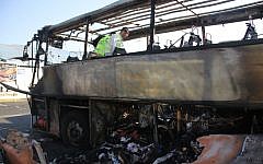 An Israeli emergency rescue team examines the remains of a bus bombed in Bulgaria in July, 2012, allegedly by Hezbollah. (Dano Monkotovic/Flash90/JTA)