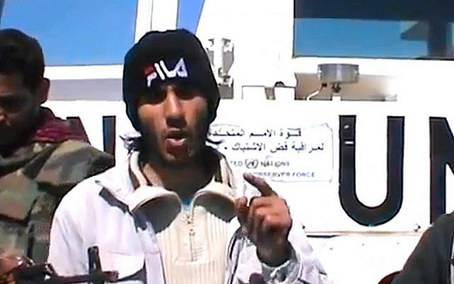 A Syrian rebel spokesman announces the capture of 21 Filipino peacekeepers on the Golan Heights, Wednesday, March 7, 2013 (photo credit: YouTube) A Syrian rebel spokesman announces the capture of 21 Filipino peacekeepers on the Golan Heights, Wednesday, March 7, 2013 (photo credit: YouTube)