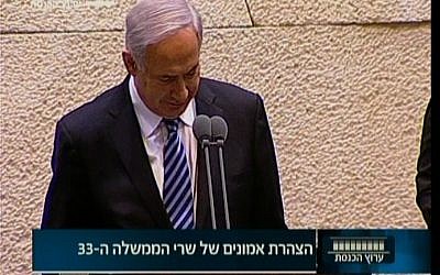Benjamin Netanyahu swearing in for a third term as prime minister. (Screenshot: Knesset Channel)