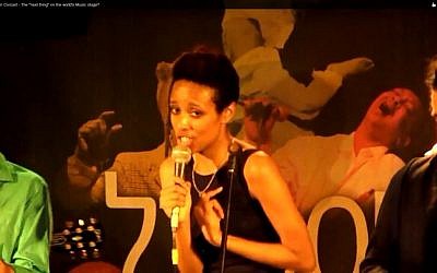 Ester Rada performing on stage (photo credit: YouTube screenshot)