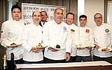 Chef Shalom Kadosh (center) poses with chefs of world leaders in Tel Aviv, February 2012. (Gideon Markowicz/Flash90)