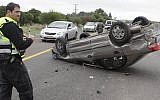 Illustrative photo of an overturned vehicle (photo credit: Edi Israel/Flash90)